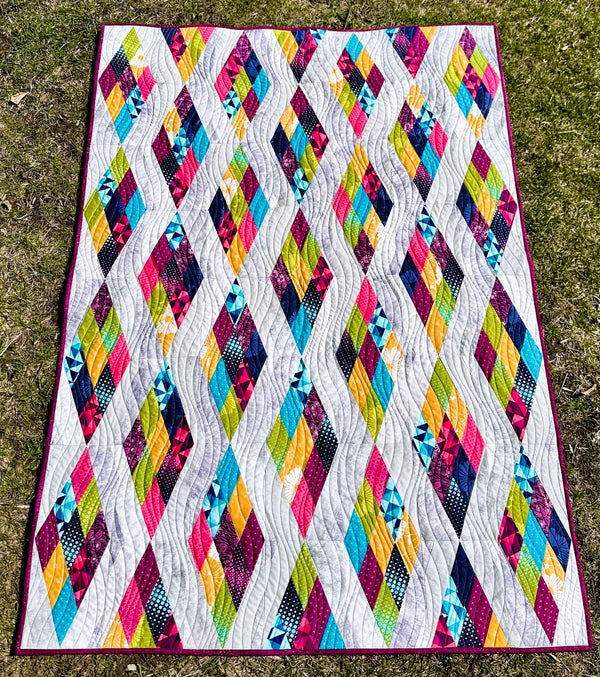 Strip N' Dip, a finished quilt from the quilt along